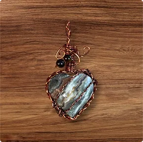 Seraphinite Heart Wrapped in Copper Wire Accented with Black Onyx