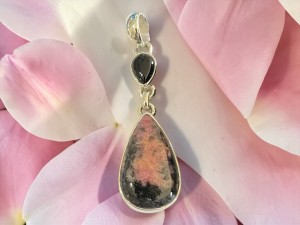 Rhodonite Teardrop Pendant Accented With Black Onyx Crystal