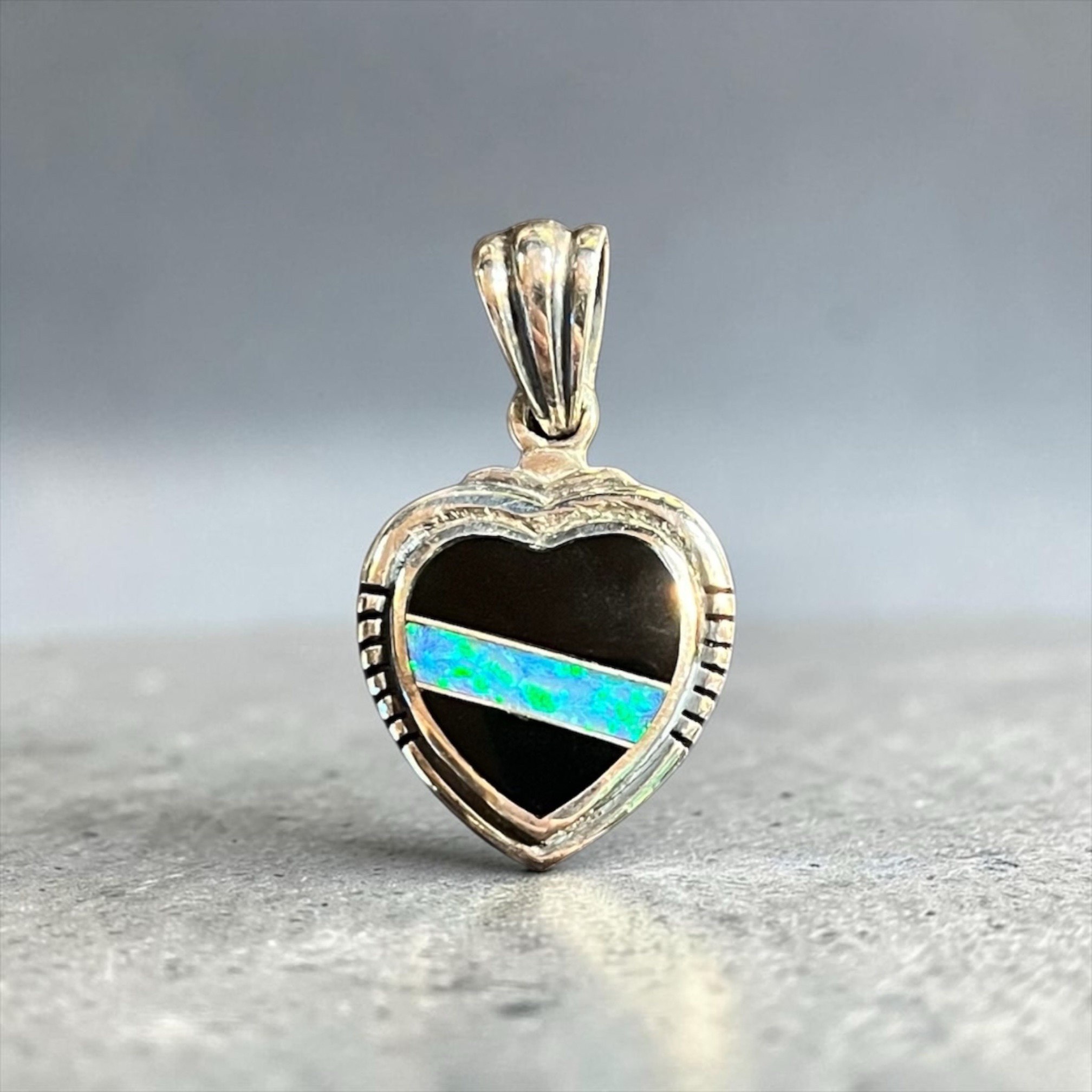 Dazzle Her With This 1" Sterling Silver Onyx And Opal Inlay Heart. Comes With 18"-20" Sterling